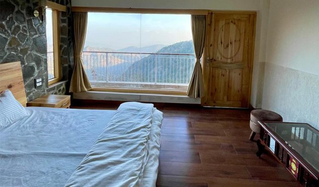 luxury room with mountain view at Mukteshwar homestay